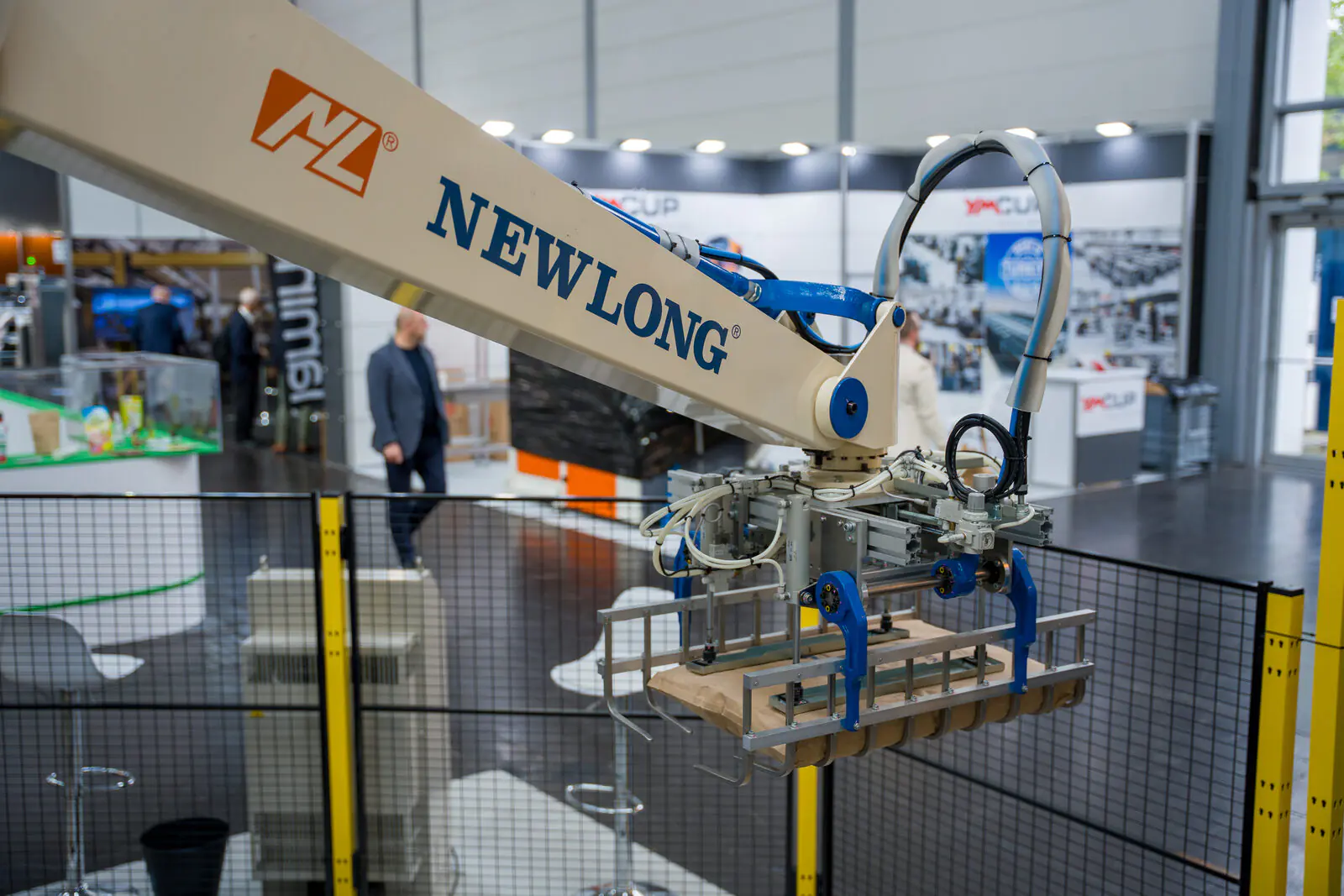 Fuji Robotics palletizer arm at the Newlong stand, Interpack 2026