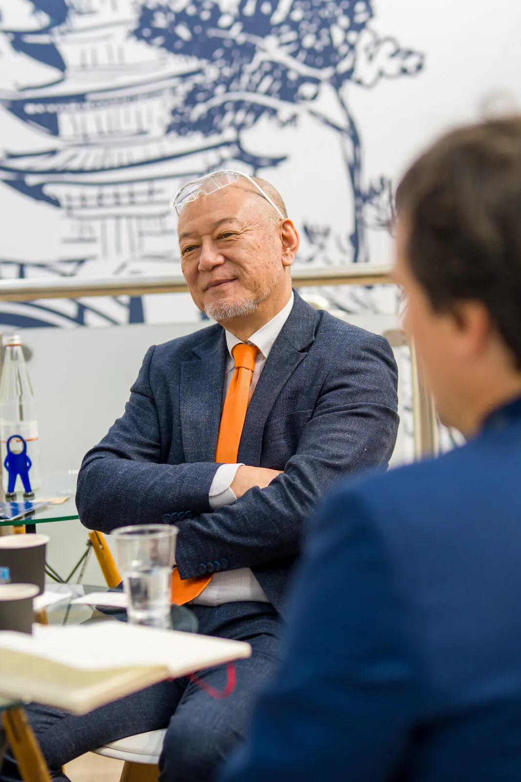 Newlong colleague from Japan in conversation at the stand
